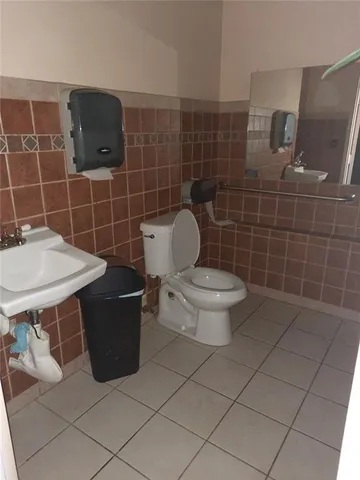 a kitchen with stainless steel appliances a refrigerator and a counter