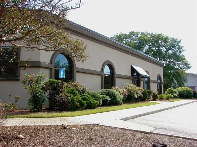 a view of street with parked cars