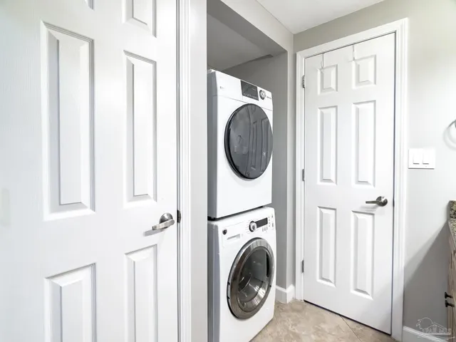 a view of a hallway with washer and dryer