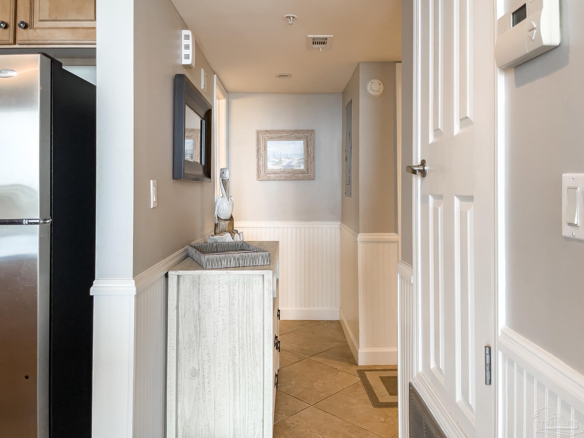 16287 Perdido Key Drive, Unit 104 Pensacola, FL 32507 - Photo 19 of 32 a bathroom with a sink and a mirror