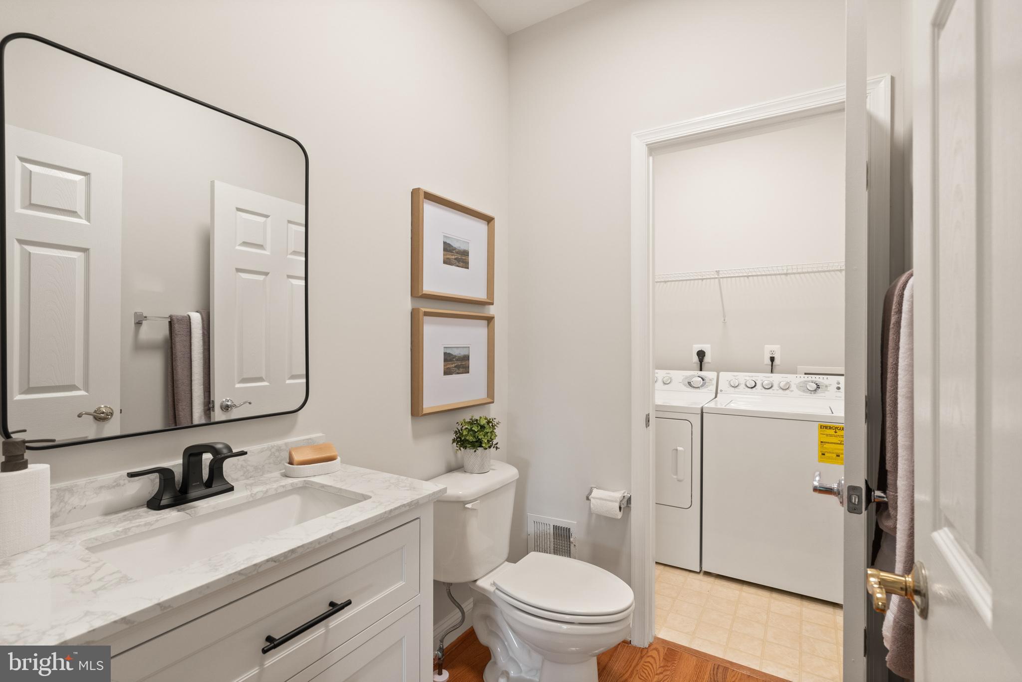 8560 Bauer Circle Springfield, VA 22152 - Photo 32 of 76 Main flr Powder Room with a new vanity and mirror