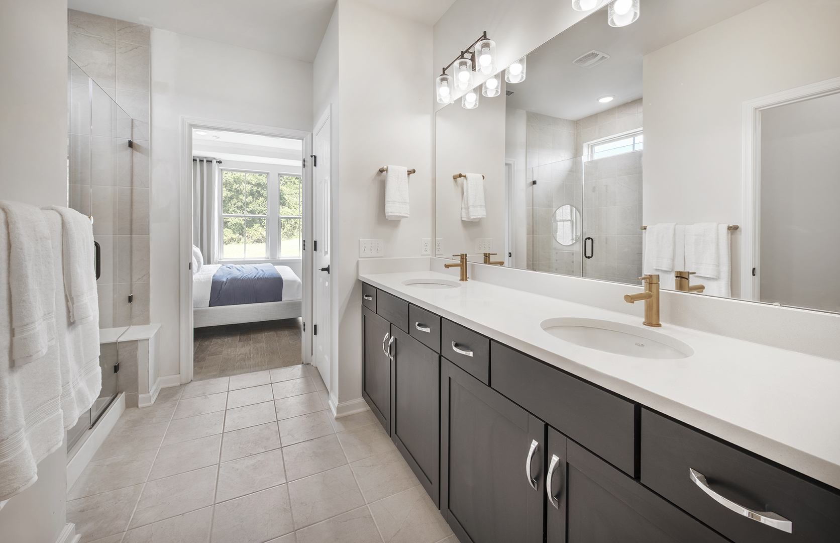 3300 Wildlight Road Aurora, IL 60503 - Photo 10 of 21 a spacious bathroom with a double vanity sink a mirror a bathtub and a shower
