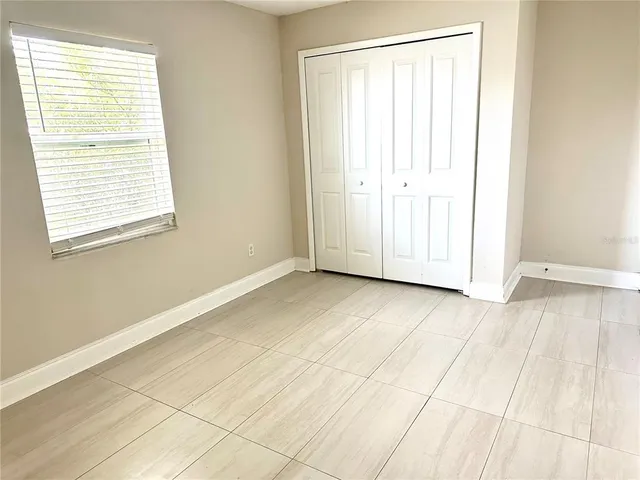 an empty room with window