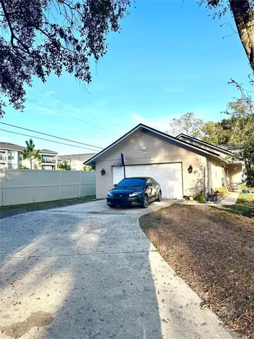 a house view with a backyard space