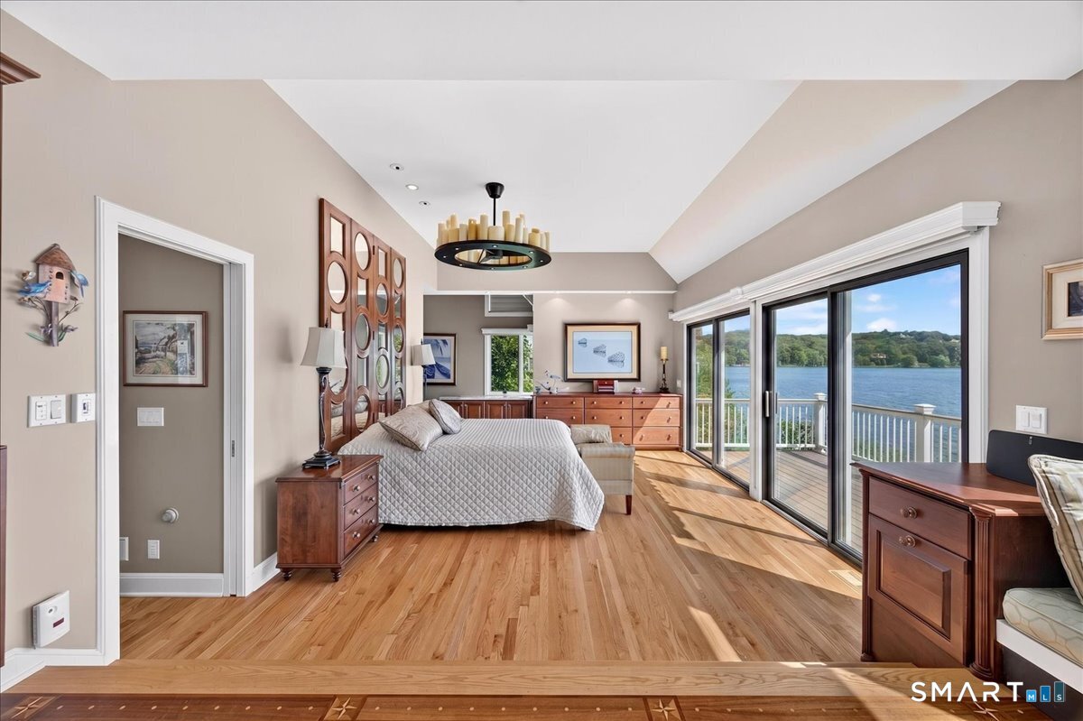 409 River Road Deep River, CT 06417 - Photo 13 of 40 Primary bedroom suite with fireplace, office area, large bathroom and walk in closet