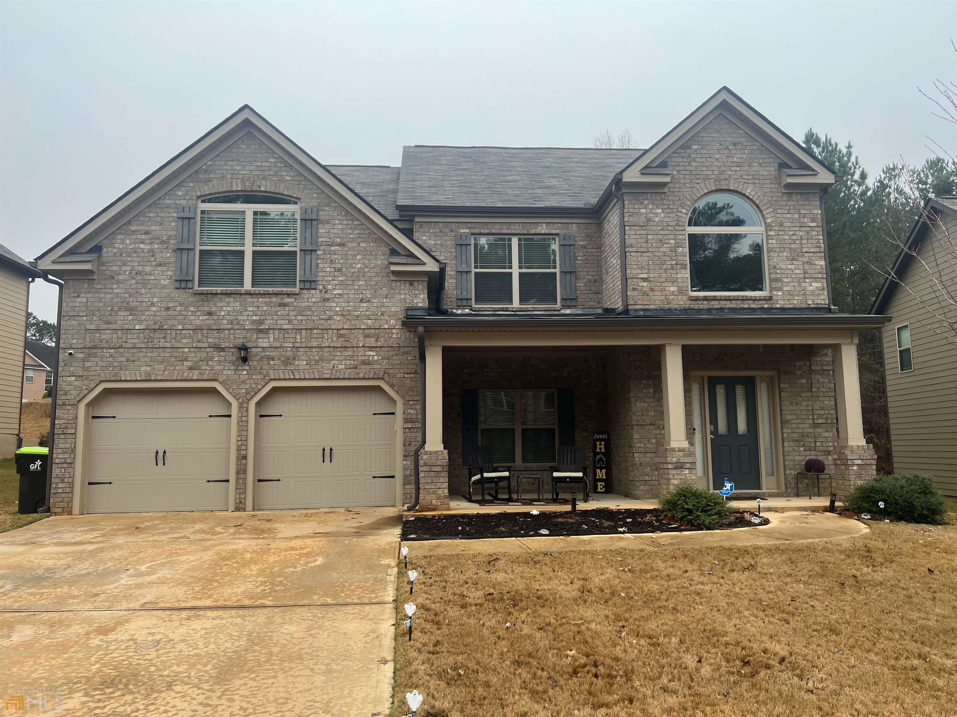 11837 Markham Way Hampton, GA 30228 - Photo 1 of 1 a view of a house with a yard and large parking space