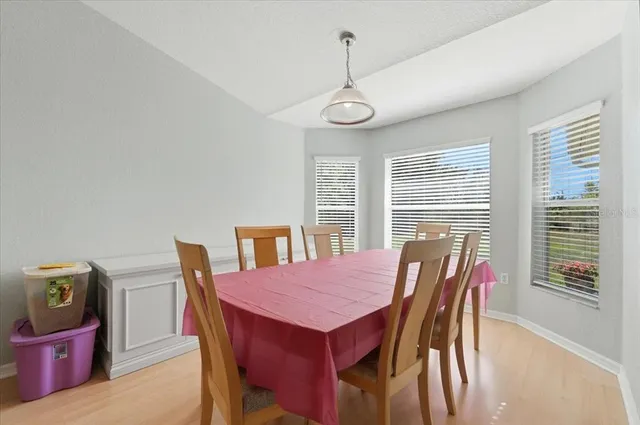 a view of a dining room with furniture
