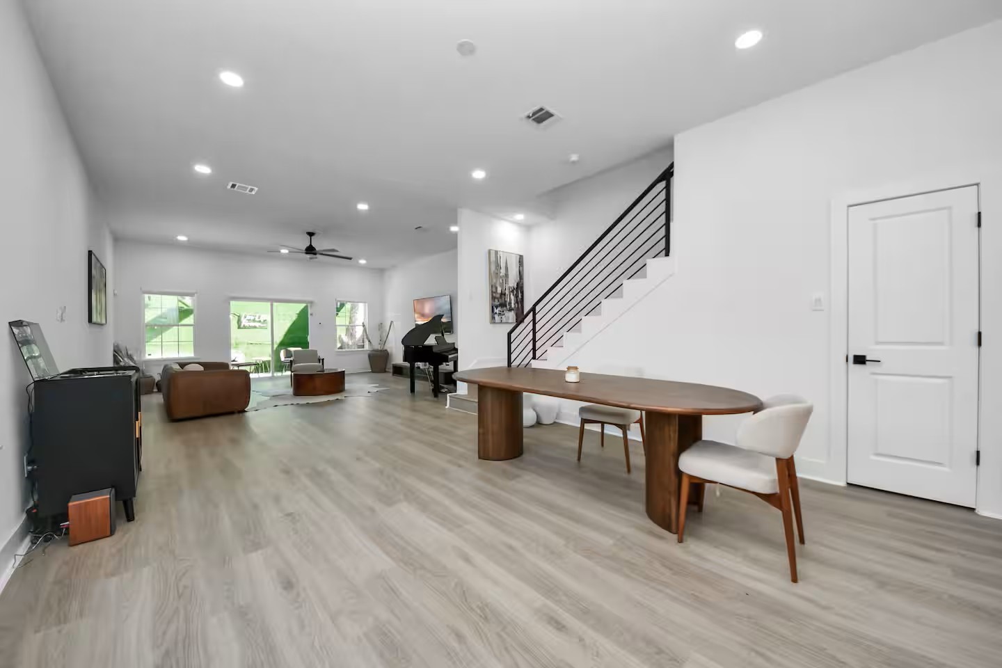 6747 Peerless Street Houston, TX 77021 - Photo 3 of 33 a living room with furniture and a wooden floor