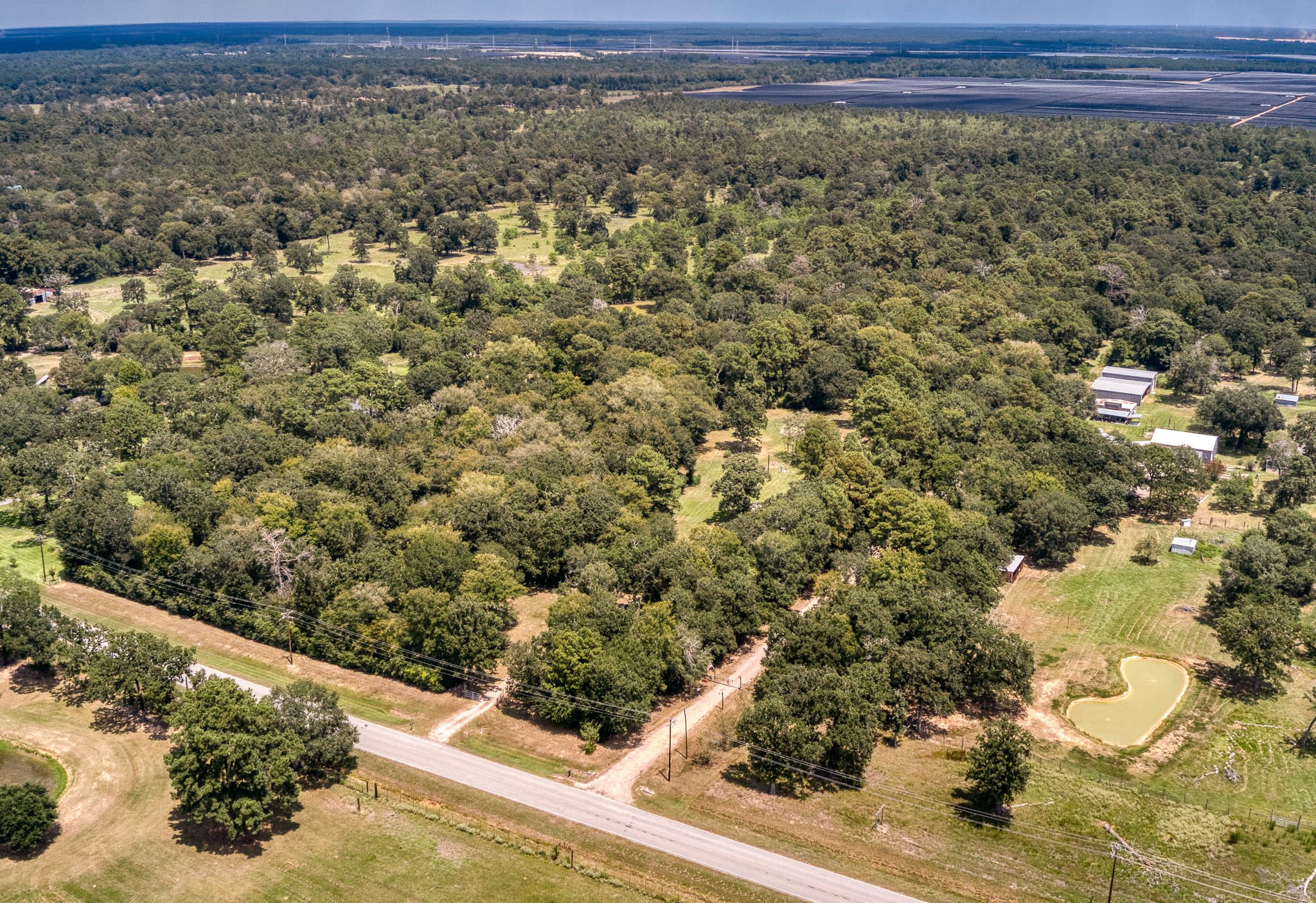 2160 Bowler Road Waller, TX 77484 - Photo 23 of 24 a view of a yard with wooden fence