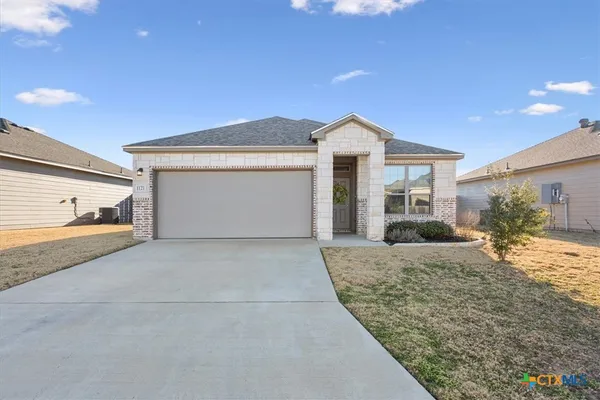 a view of a house with a patio