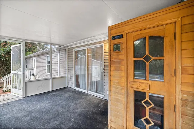 a view of balcony with wooden floor