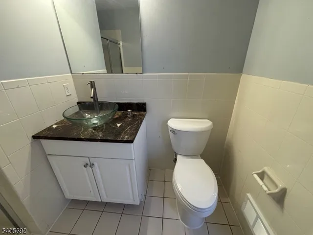 a bathroom with a toilet and a sink