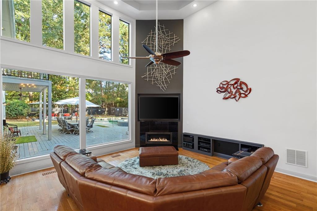 2994 East Ramble Lane Decatur, GA 30033 - Photo 11 of 111 a living room with furniture and a fireplace