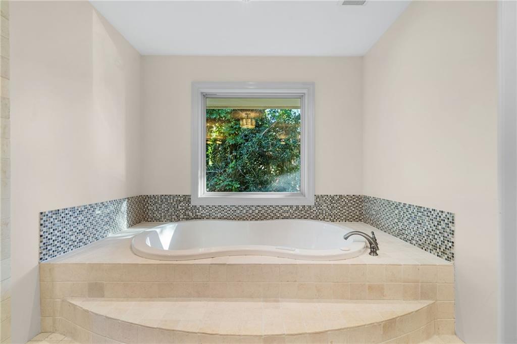 2994 East Ramble Lane Decatur, GA 30033 - Photo 35 of 111 a bathroom with a bathtub