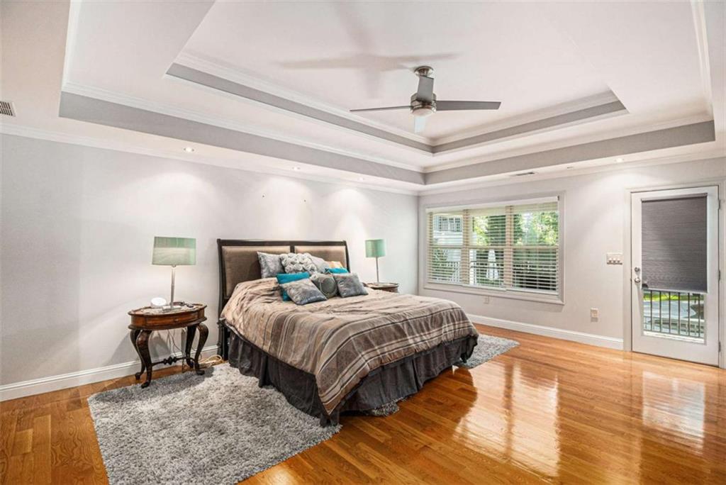 2994 East Ramble Lane Decatur, GA 30033 - Photo 36 of 111 a bedroom with a bed and wooden floor