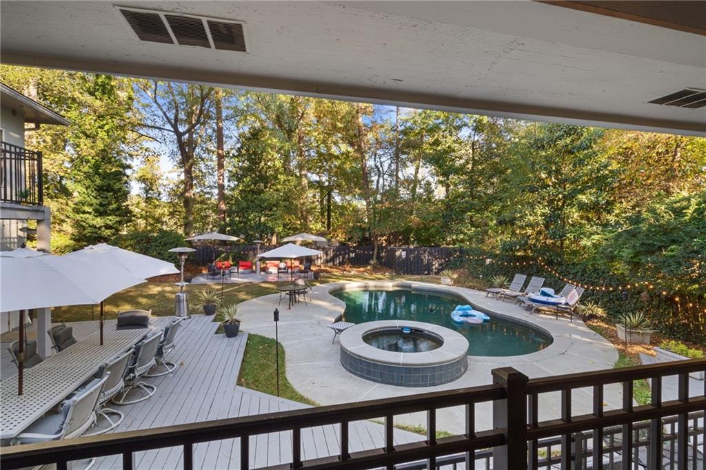 2994 East Ramble Lane Decatur, GA 30033 - Photo 38 of 111 a view of a balcony dining table and chairs