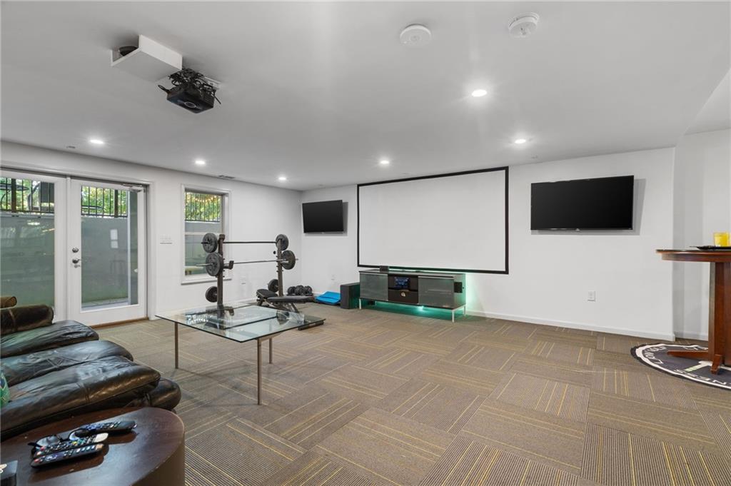 2994 East Ramble Lane Decatur, GA 30033 - Photo 46 of 111 a living room with furniture and a flat screen tv