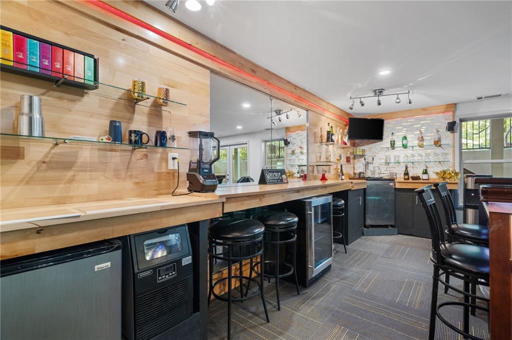 2994 East Ramble Lane Decatur, GA 30033 - Photo 50 of 111 a kitchen with lots of counter top space and dining table