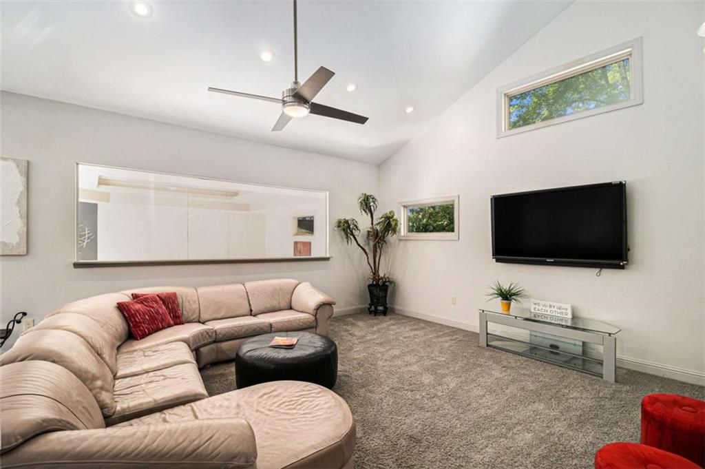 2994 East Ramble Lane Decatur, GA 30033 - Photo 67 of 111 a living room with furniture and a flat screen tv