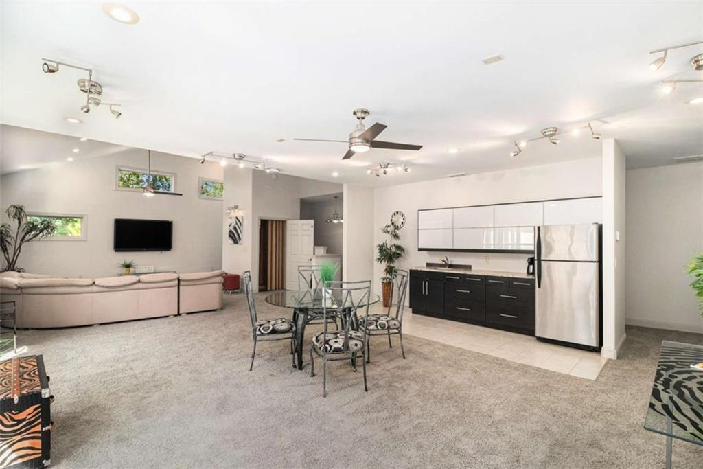 2994 East Ramble Lane Decatur, GA 30033 - Photo 69 of 111 a living room with furniture and a flat screen tv