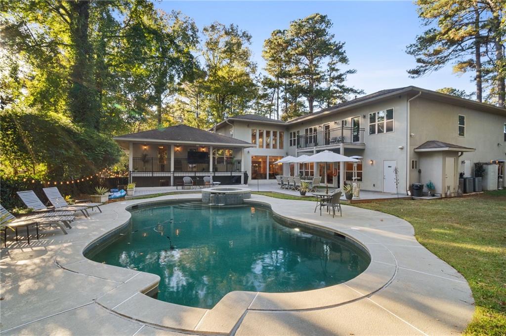 2994 East Ramble Lane Decatur, GA 30033 - Photo 80 of 111 a view of a house with swimming pool and sitting area