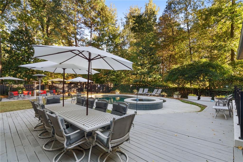 2994 East Ramble Lane Decatur, GA 30033 - Photo 87 of 111 a view of house with patio outdoor seating and covered with trees