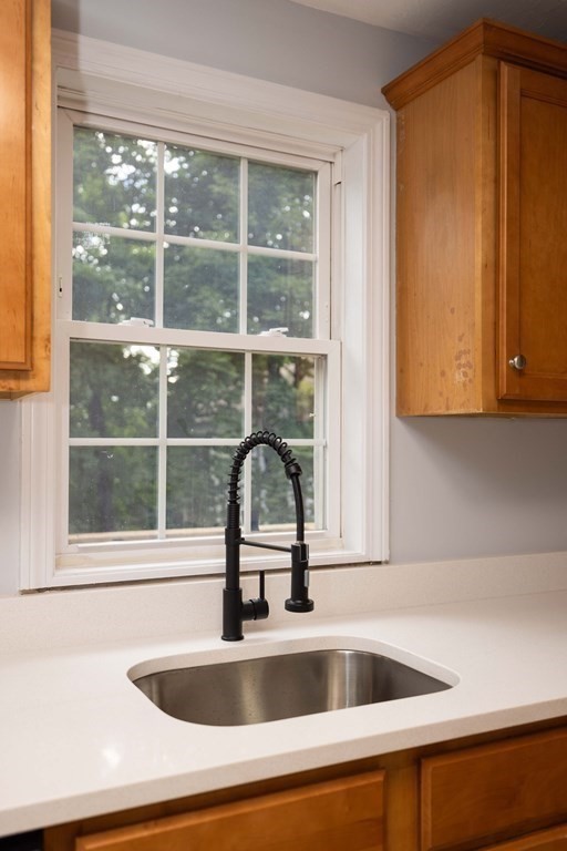 32 Rodney Street Worcester, MA 01605 - Photo 11 of 37 a close view of sink and tap