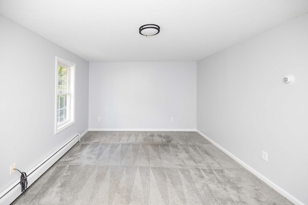 32 Rodney Street Worcester, MA 01605 - Photo 16 of 37 a view of an empty room with a window