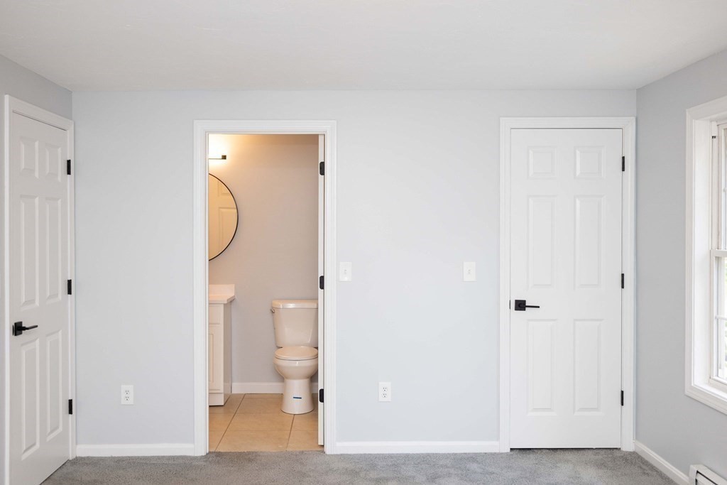 32 Rodney Street Worcester, MA 01605 - Photo 18 of 37 a view of a bathroom with wooden floor