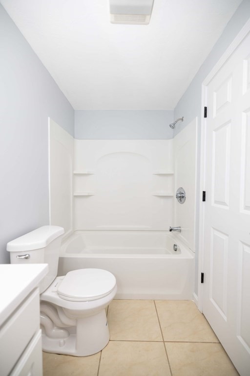 32 Rodney Street Worcester, MA 01605 - Photo 19 of 37 a bathroom with a toilet and a shower