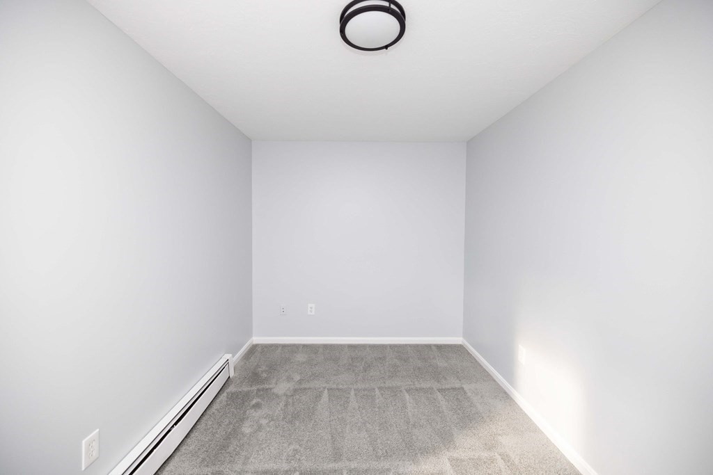 32 Rodney Street Worcester, MA 01605 - Photo 25 of 37 a view of a room with racks on the wall