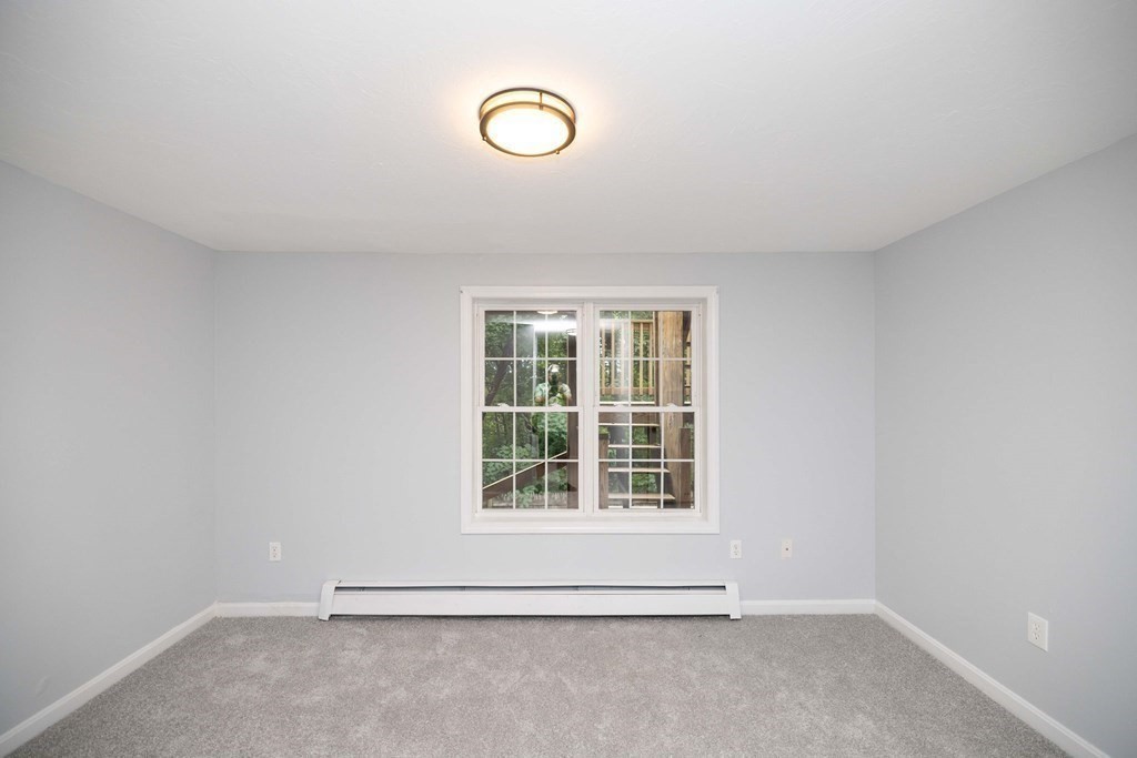 32 Rodney Street Worcester, MA 01605 - Photo 27 of 37 an empty room with a window