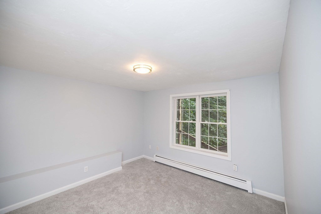 32 Rodney Street Worcester, MA 01605 - Photo 29 of 37 an empty room with a window