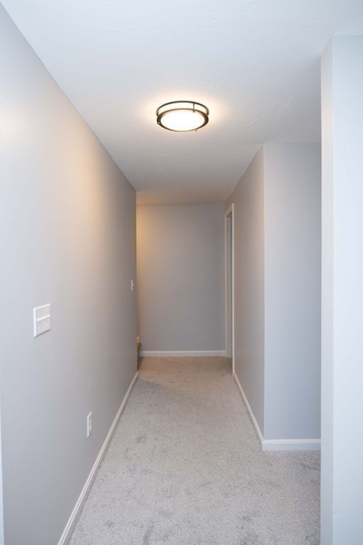 32 Rodney Street Worcester, MA 01605 - Photo 31 of 37 a view of an empty room with a window