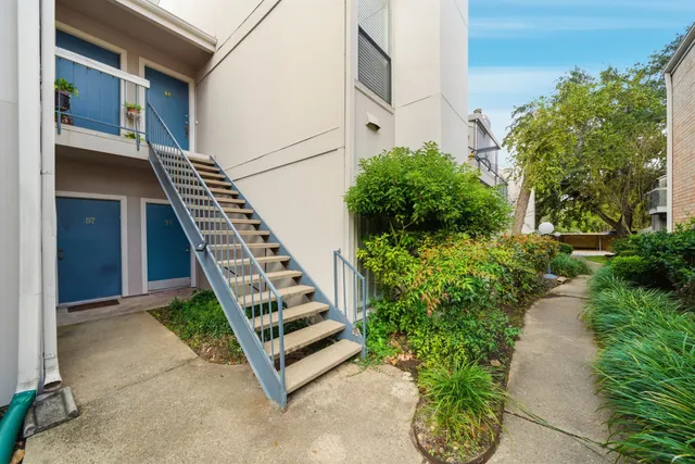 a view of swimming pool with lounge chair