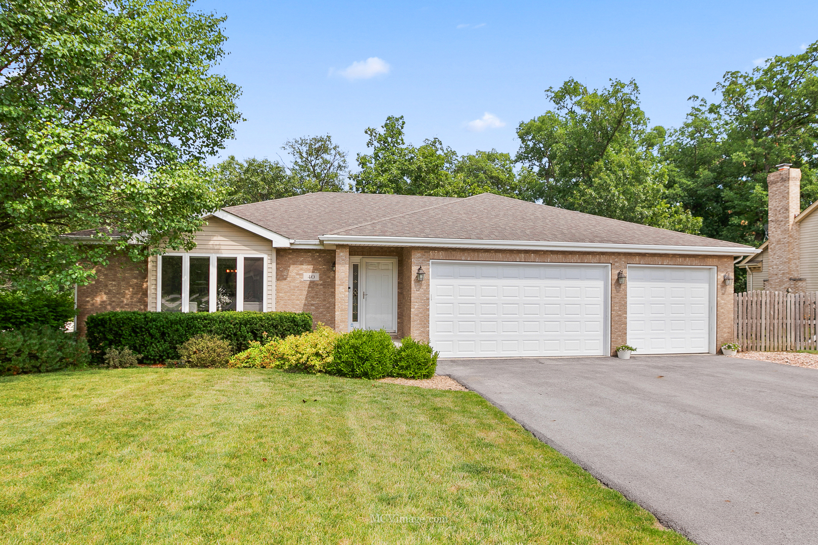 40 Zurich Court Crete, IL 60417 - Photo 1 of 40 a front view of a house with a yard and garage