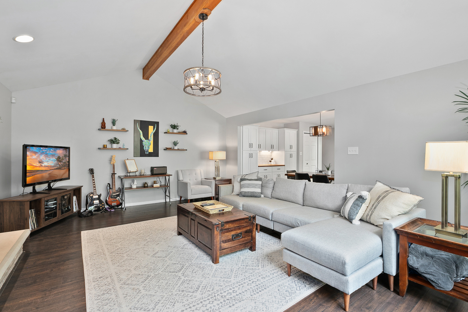 40 Zurich Court Crete, IL 60417 - Photo 15 of 40 a living room with furniture kitchen view and a wooden floor