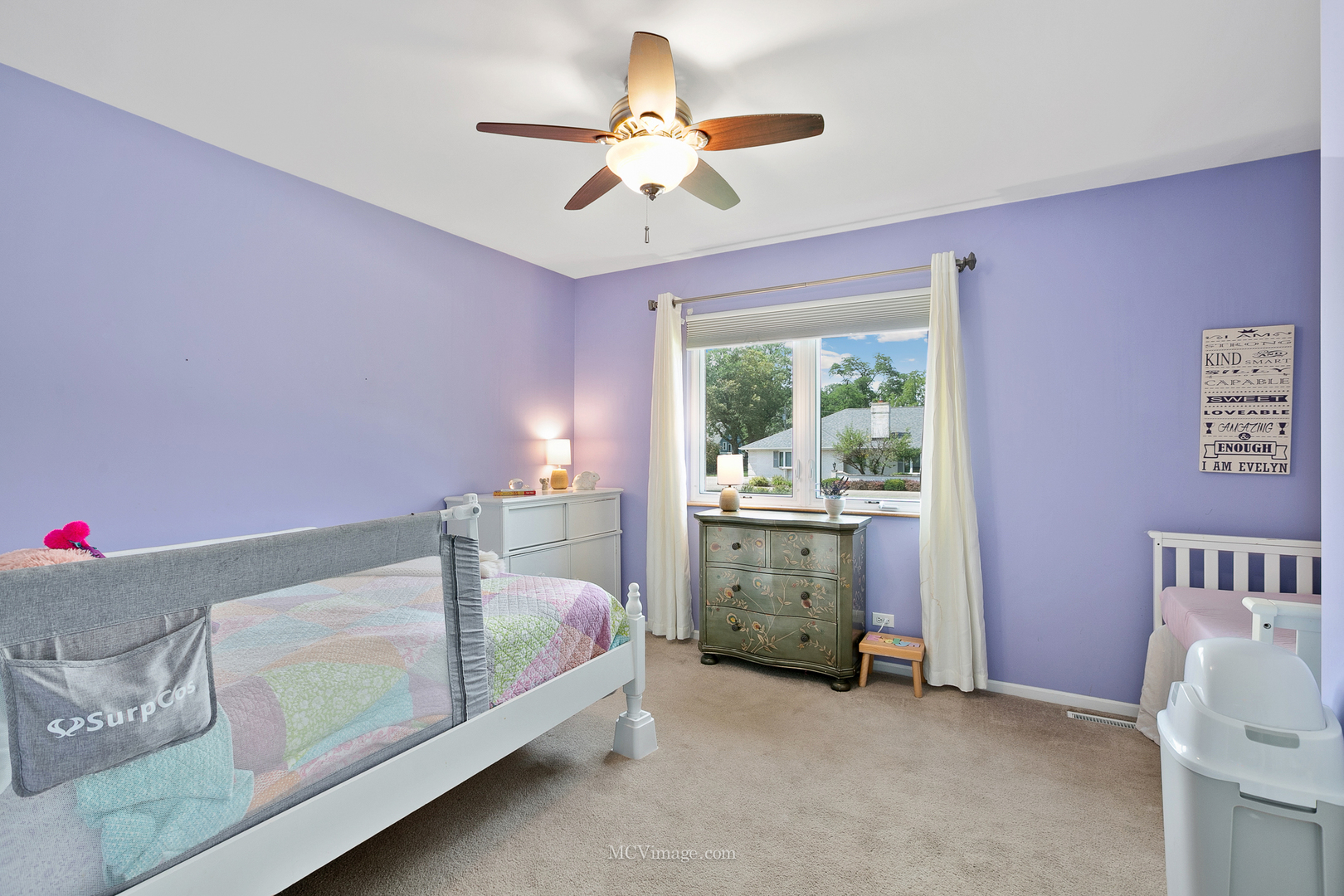 40 Zurich Court Crete, IL 60417 - Photo 19 of 40 a bedroom with a bed and a chandelier