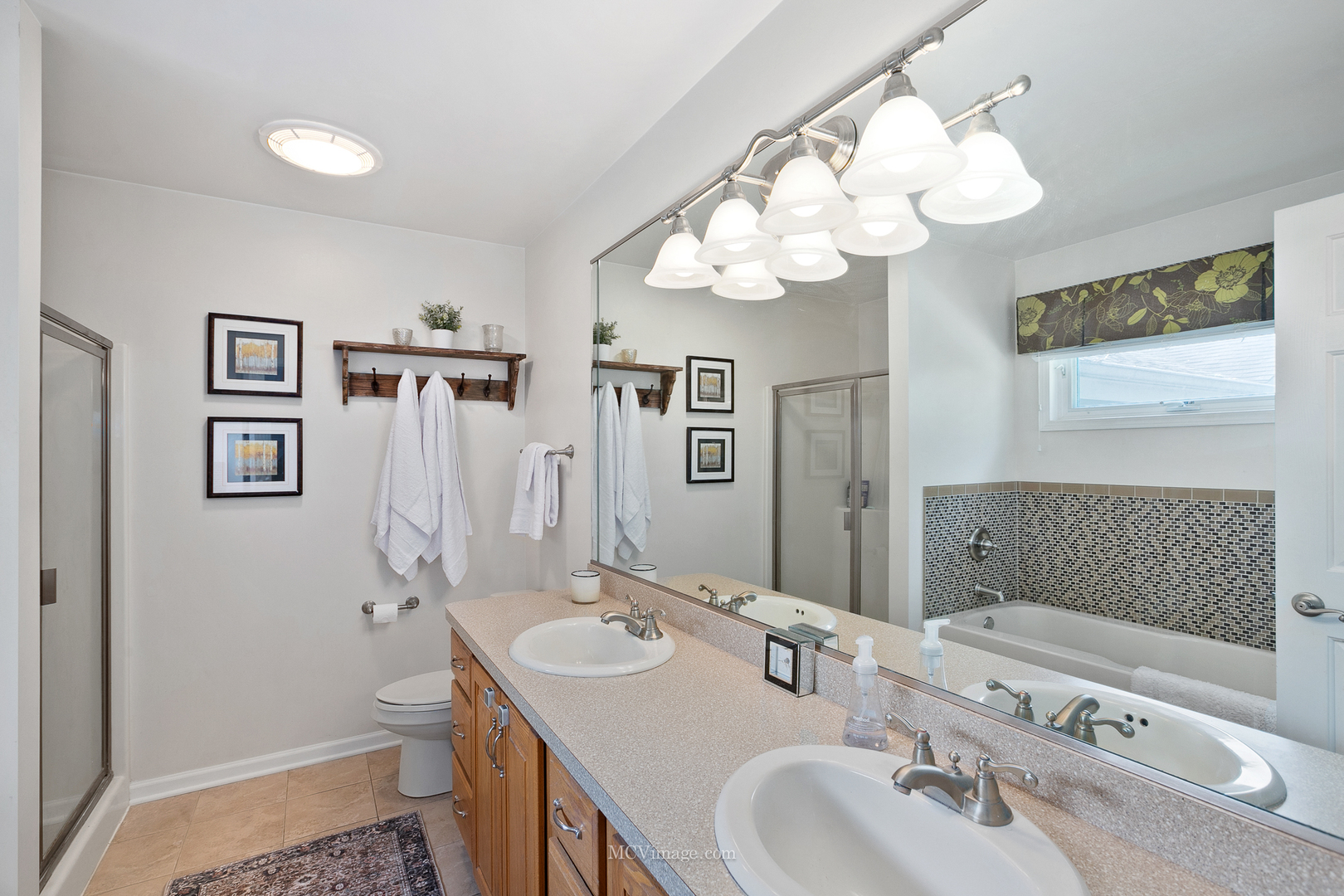 40 Zurich Court Crete, IL 60417 - Photo 23 of 40 a bathroom with a sink a mirror and a toilet