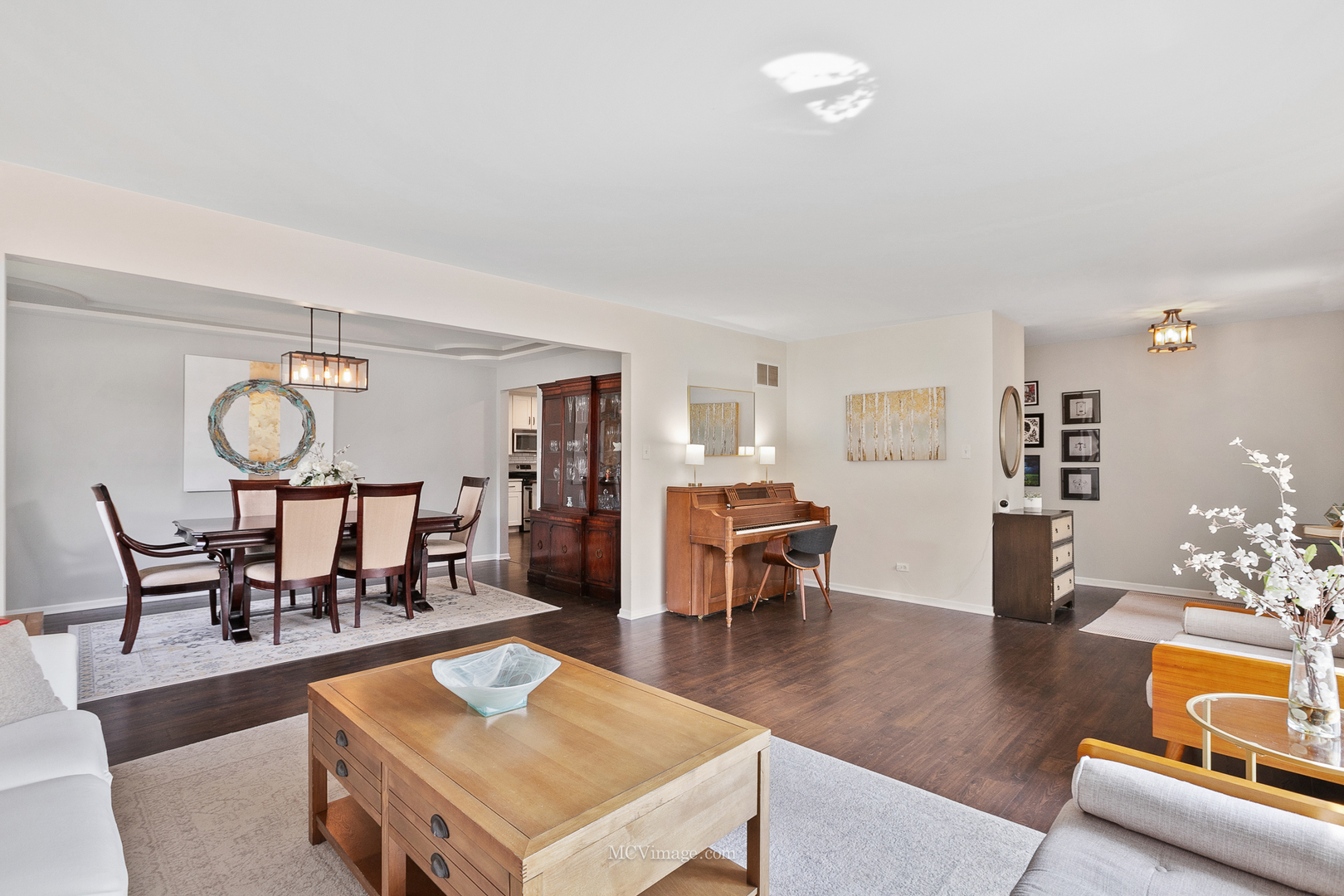 40 Zurich Court Crete, IL 60417 - Photo 7 of 40 a living room with furniture a rug and a dining table