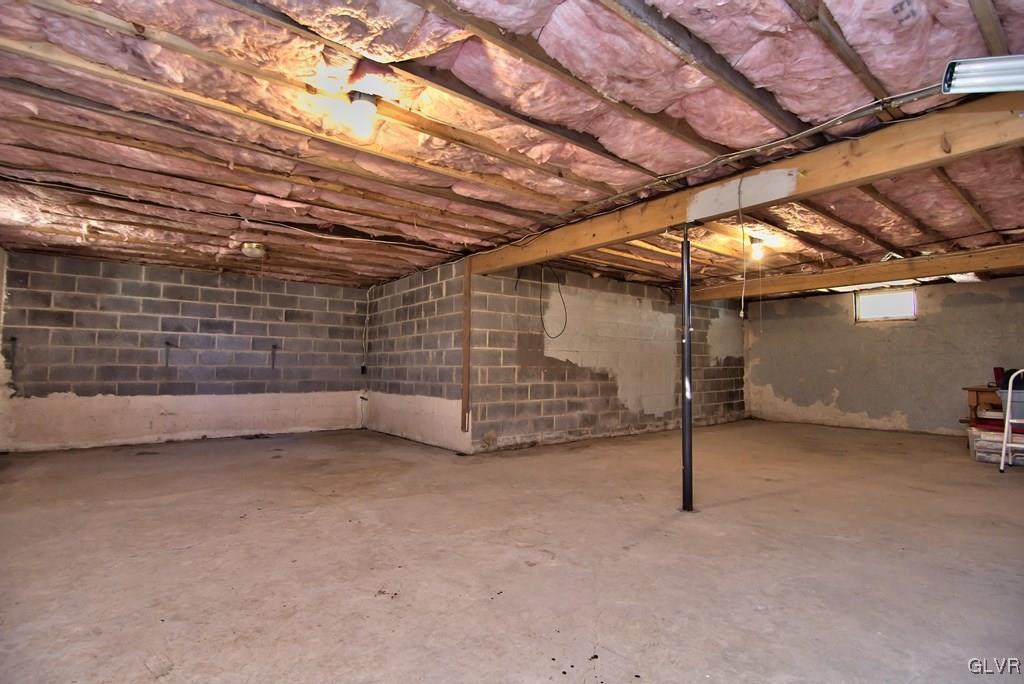 202 McKay Road Henryville, PA 18332 - Photo 33 of 41 Alternate view of the unfinished basement with lot