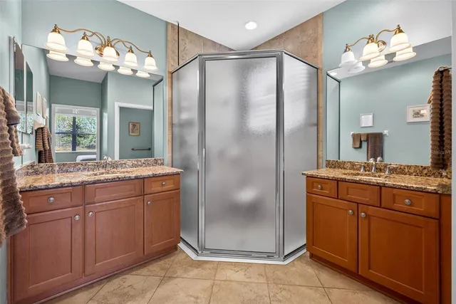 a view of a floor to ceiling window and wooden floor