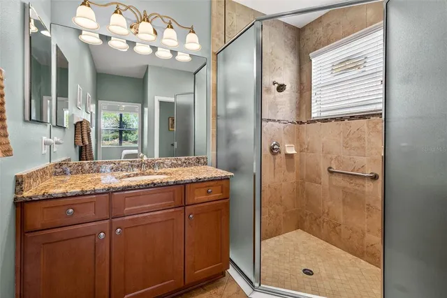 a balcony view with a sink and outdoor seating