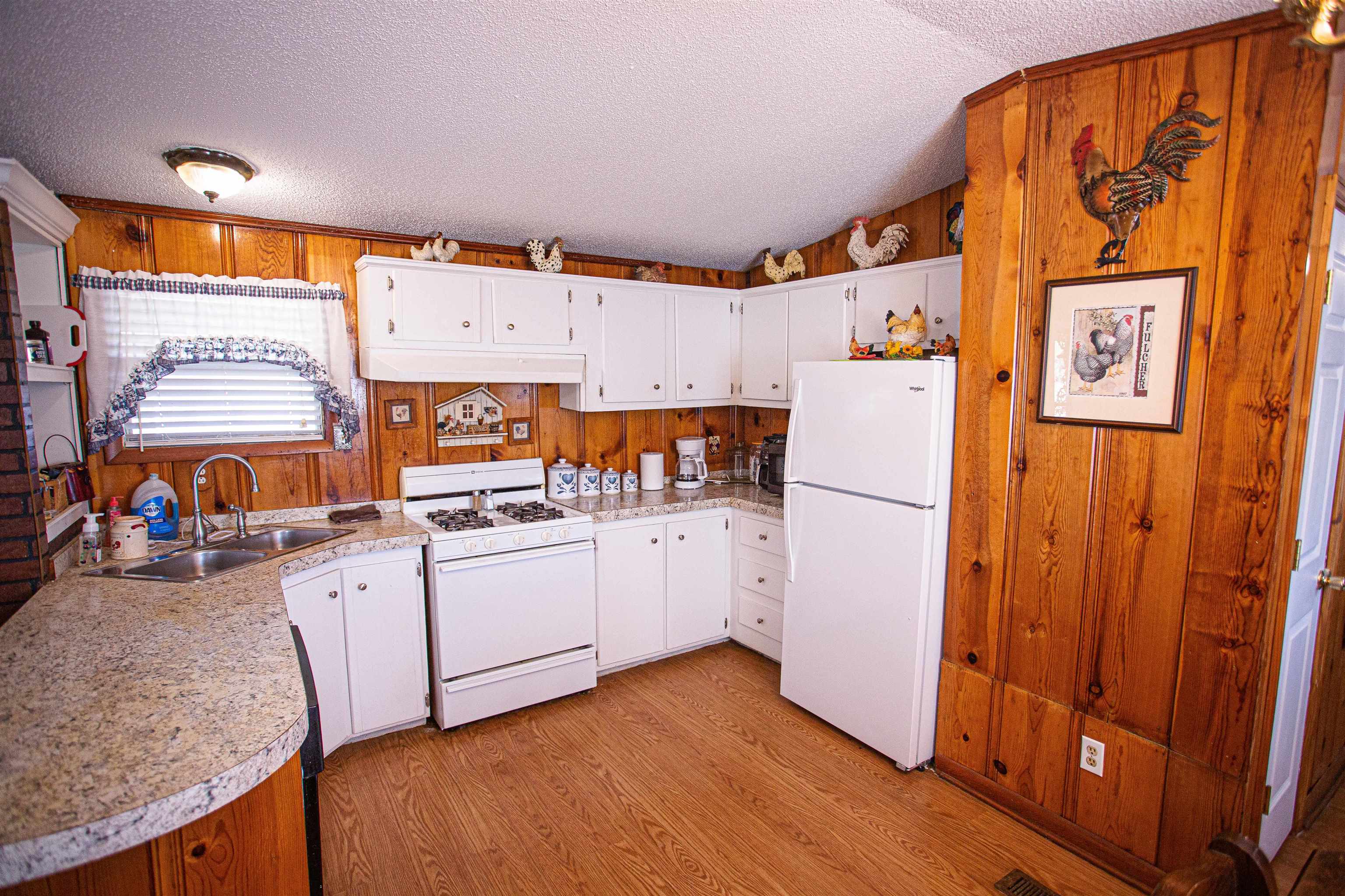 4100 Highway 209 Ripley, TN 38063 - Photo 9 of 36 a kitchen with a refrigerator and countertop