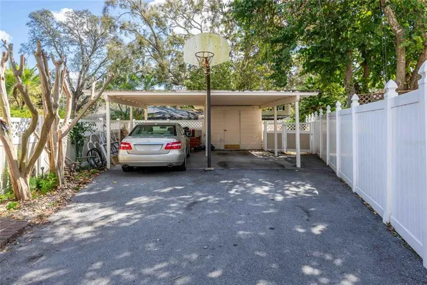 a view of a car park in front of house