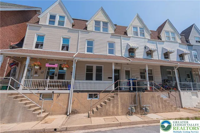 a front view of multiple houses