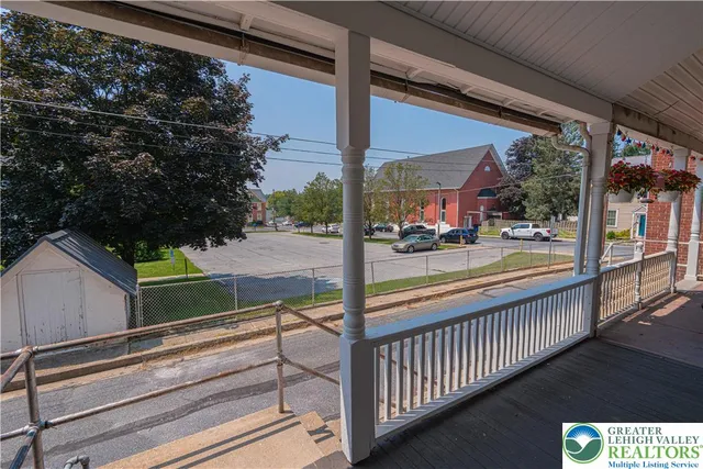 a view of a street from a balcony
