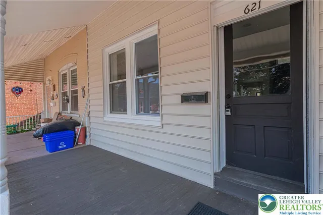 a backyard of a house with seating space