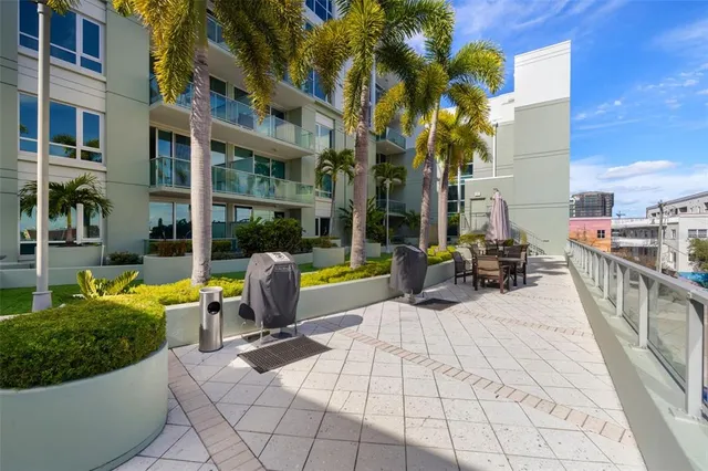 a view of a swimming pool with a patio