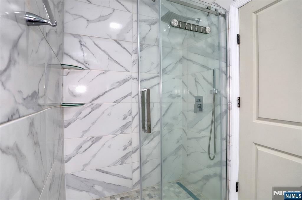 9017 Riverside Place North Bergen, NJ 07047 - Photo 13 of 27 a bathroom with a shower